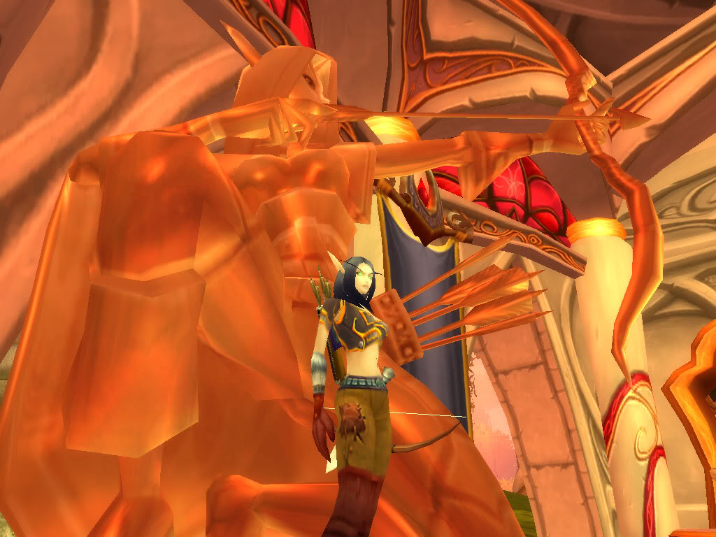 A screencap of a World of Warcraft female Blood Elf Hunter standing in front of a ranger statue in Silvermoon City